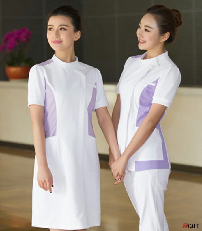 Đồng phục nhân viên spa và nhân viên lễ tân màu trắng kết hợp tím (Ảnh: Internet)